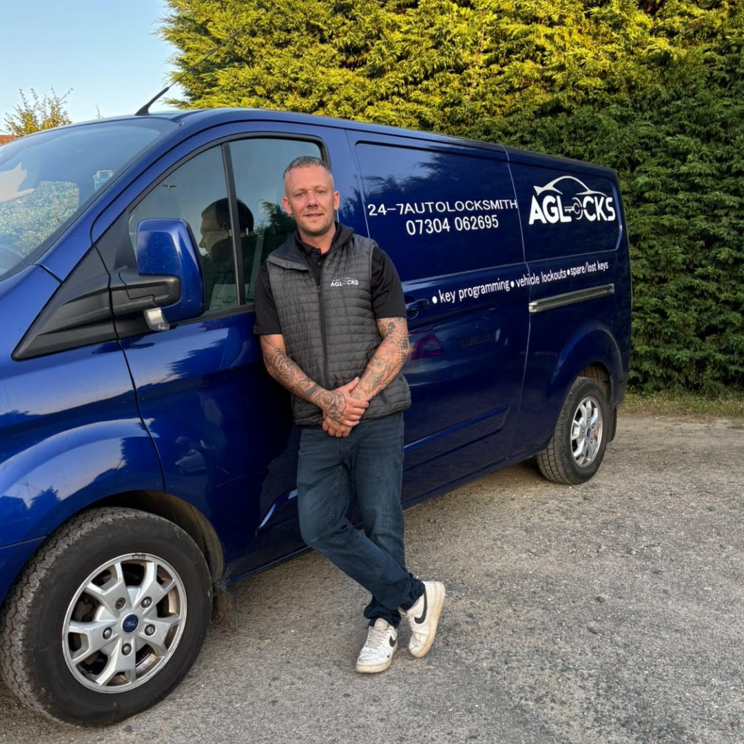 AG Locks mobile auto locksmith attending a vehicle